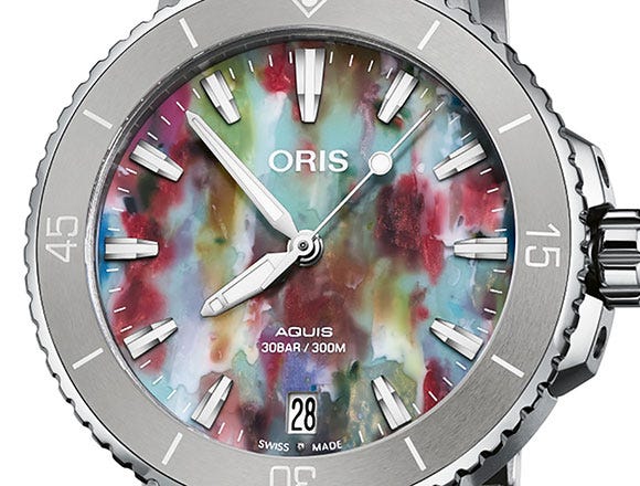 https://images.watchfinder.co.uk/images/watchfinderimages/media/articles/0/2022/01/17/Oris-Aquis-Date-Upcycle-4.jpg